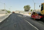 اجرای عملیات آسفالت در محله ابوذر شهر تاریخی کنگ